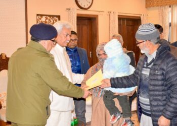 Nowgam Accidental Blast: LG Sinha meets families of martyrs, hands over appointment letters to NOKs 