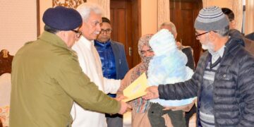 Nowgam Accidental Blast: LG Sinha meets families of martyrs, hands over appointment letters to NOKs 
